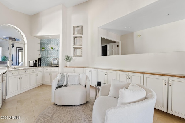 10205 E Corrine Dr, Scottsdale, AZ 85260 - sitting room with light tile patterned floors and a towering ceiling