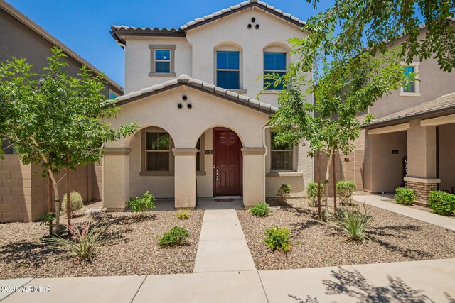5812 W Illini St, Phoenix, AZ 85043 - mediterranean / spanish-style home featuring a tiled roof and stucco siding