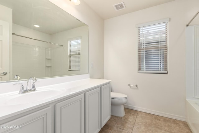 5812 W Illini St, Phoenix, AZ 85043 - full bath featuring vanity, tile patterned flooring, and  shower combination