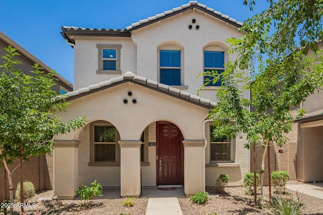 5812 W Illini St, Phoenix, AZ 85043 - mediterranean / spanish home featuring a tiled roof and stucco siding