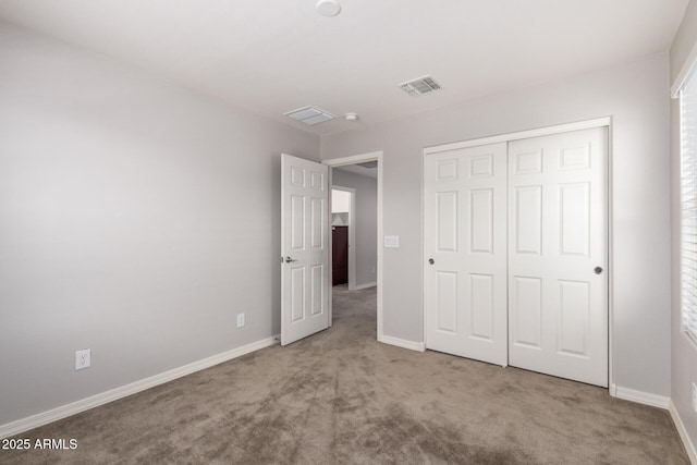 5812 W Illini St, Phoenix, AZ 85043 - unfurnished bedroom with carpet floors and a closet
