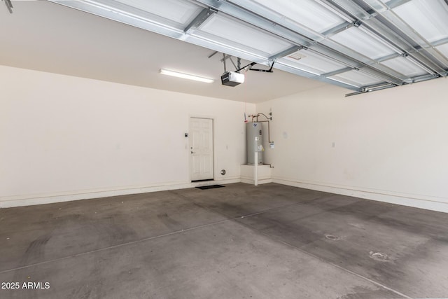 5812 W Illini St, Phoenix, AZ 85043 - garage featuring electric water heater and a garage door opener