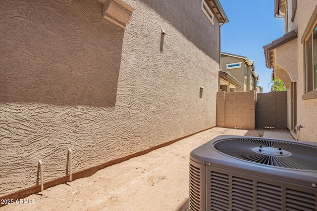 5812 W Illini St, Phoenix, AZ 85043 - exterior view of a central air condition unit and stucco siding