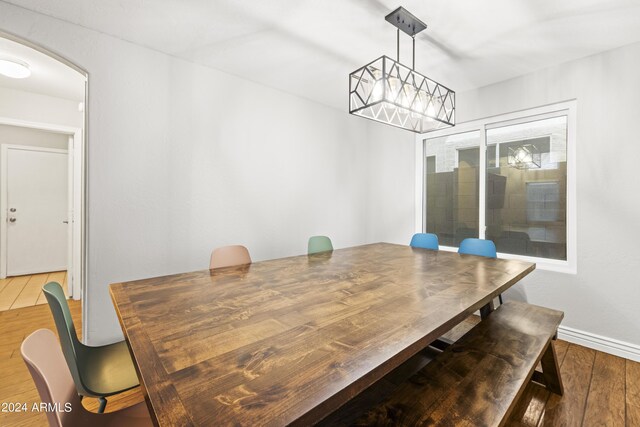 dining room with hardwood / wood-style flooring