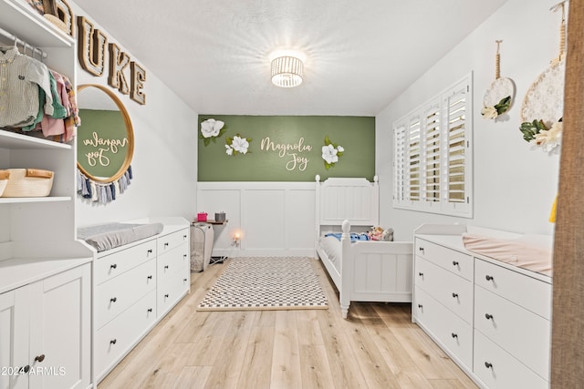 bedroom with light wood-type flooring