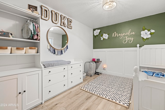 bedroom featuring light wood-type flooring