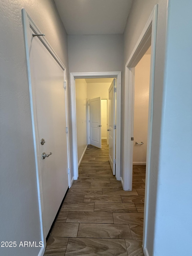 1720 W Pollack St, Phoenix, AZ 85041 - corridor with wood tiled floors and baseboards