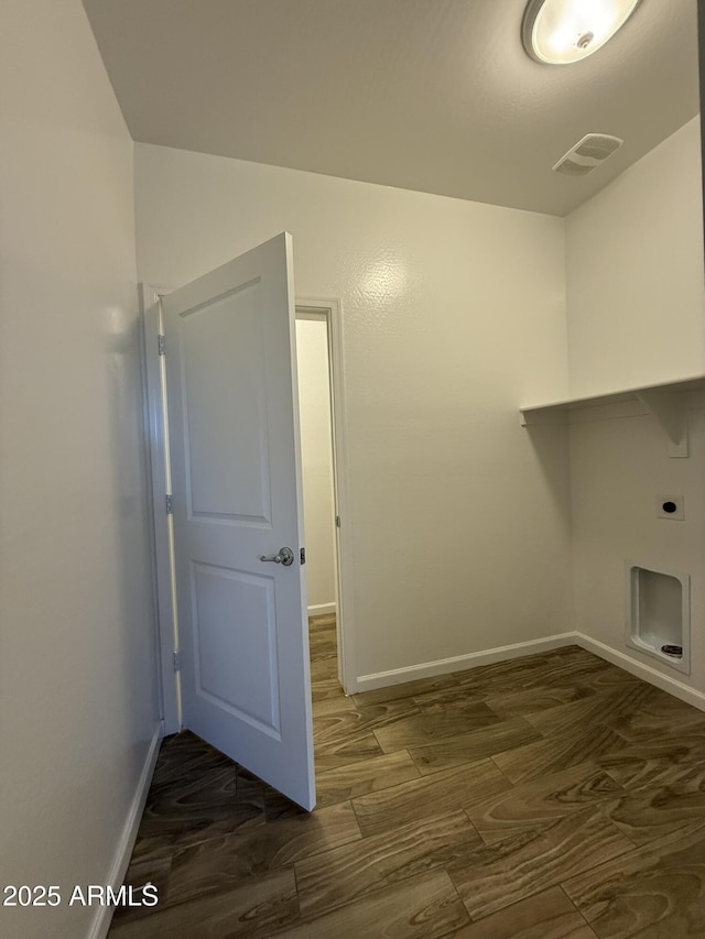 1720 W Pollack St, Phoenix, AZ 85041 - washroom featuring hookup for an electric dryer, baseboards, and wood finished floors