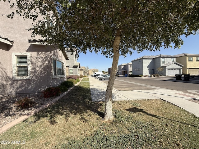 1720 W Pollack St, Phoenix, AZ 85041 - view of asphalt road with a residential view and sidewalks