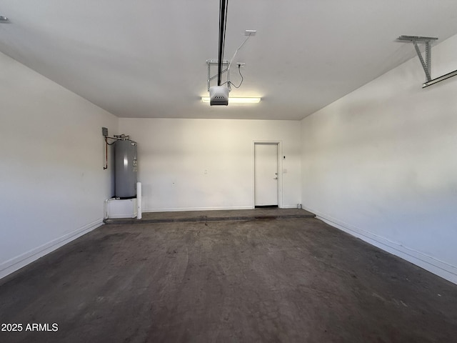 1720 W Pollack St, Phoenix, AZ 85041 - garage with water heater, a garage door opener, and baseboards