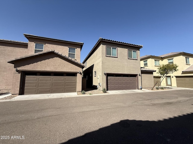 1720 W Pollack St, Phoenix, AZ 85041 - view of front of home with stucco siding and a tile roof