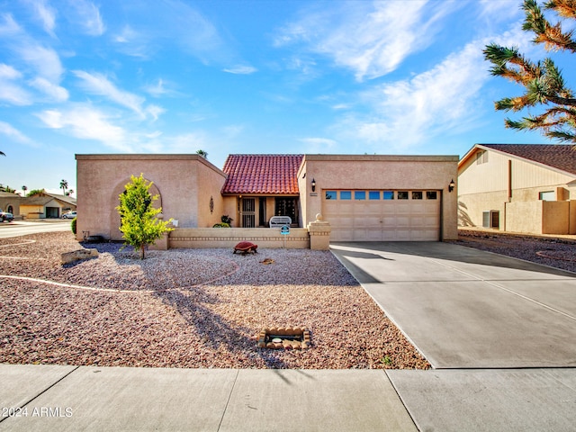 view of front of home with a garage