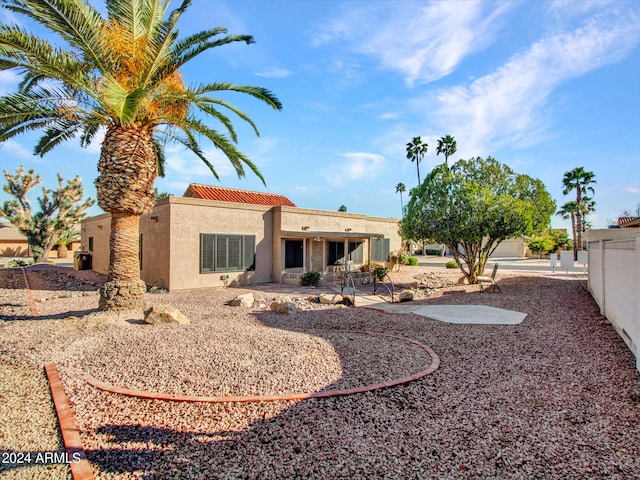 rear view of property with a patio