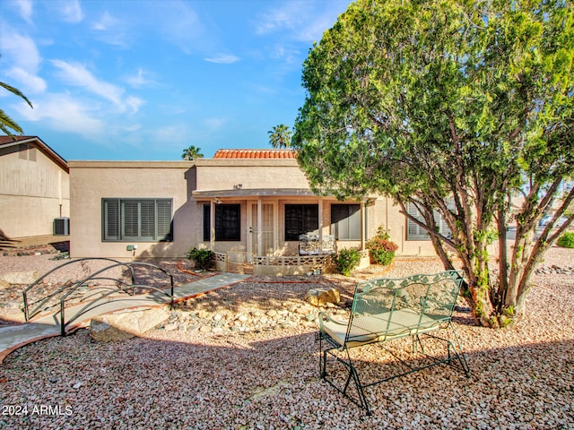 rear view of property with a patio area