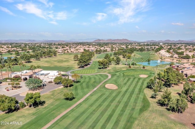 birds eye view of property featuring a water and mountain view