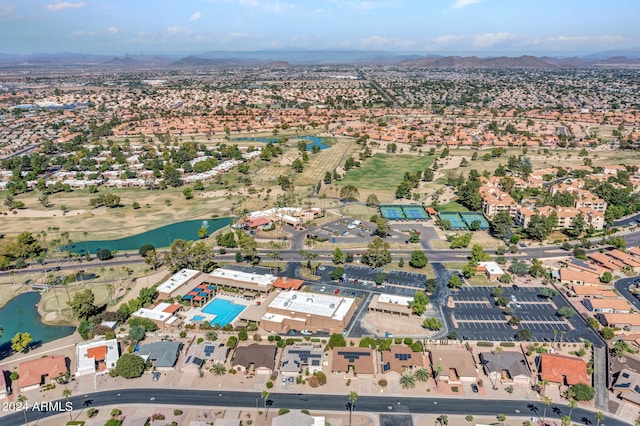 drone / aerial view featuring a water and mountain view