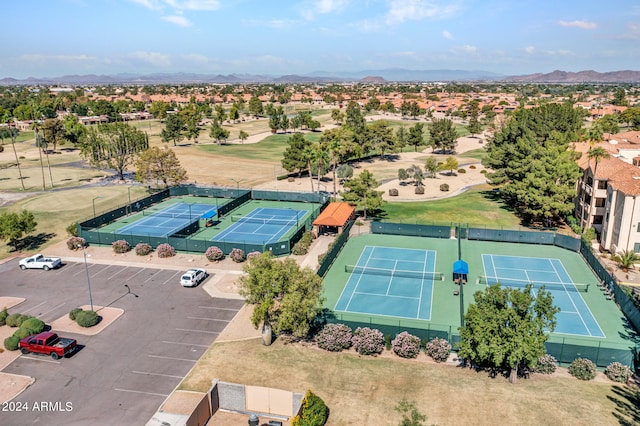 birds eye view of property featuring a mountain view