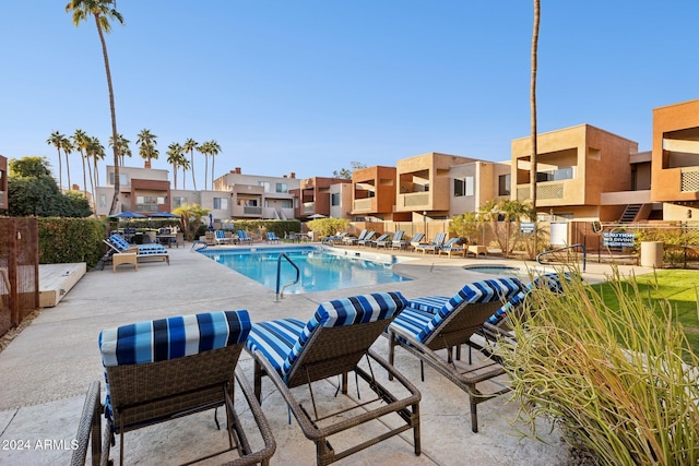 view of swimming pool featuring a patio