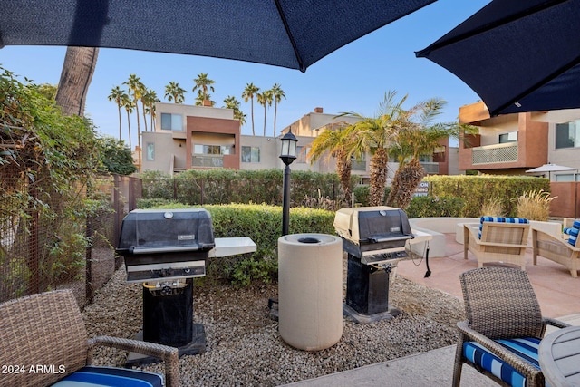 view of patio / terrace with outdoor lounge area and a grill