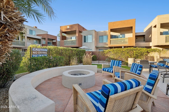 view of patio / terrace featuring a fire pit