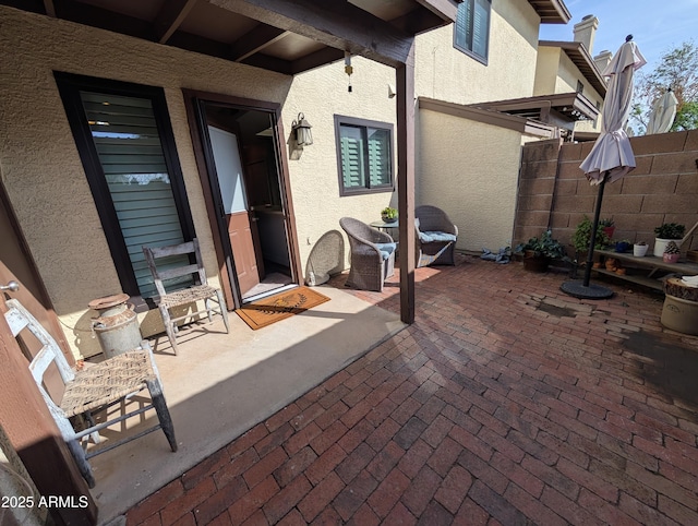 view of patio / terrace with fence