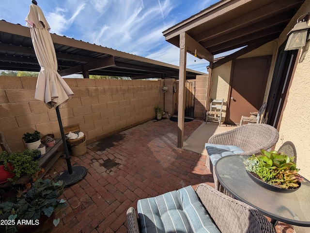 view of patio with fence