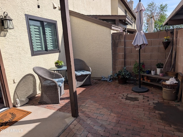 view of patio / terrace with fence