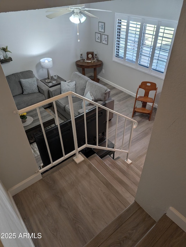 unfurnished bedroom featuring baseboards and wood finished floors