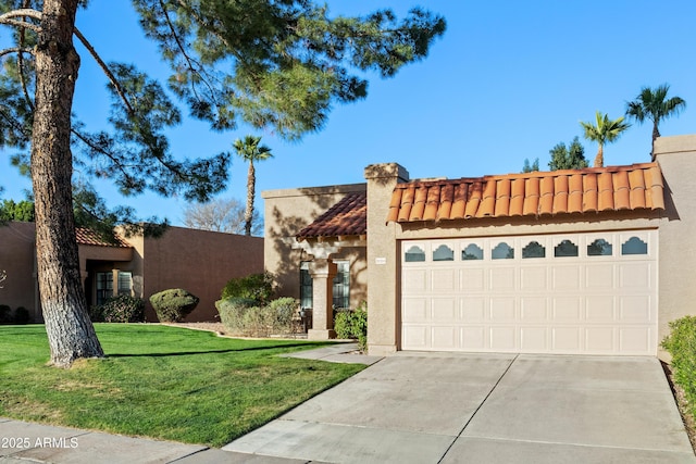 view of front of property featuring stucco siding, a front lawn, driveway, an attached garage, and a tiled roof