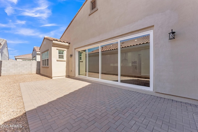 view of patio / terrace with fence