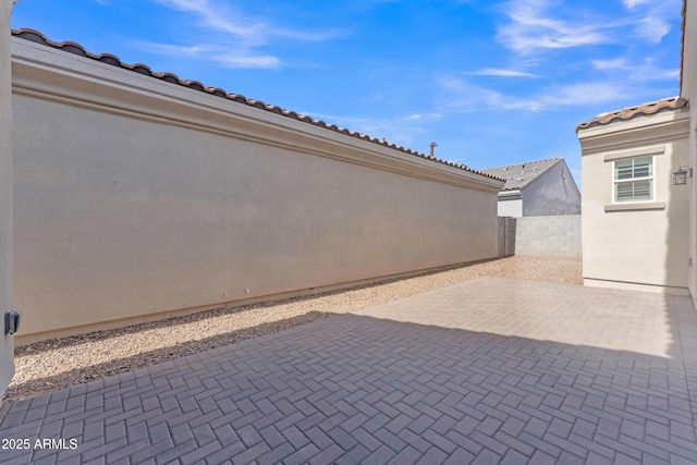 view of patio with fence