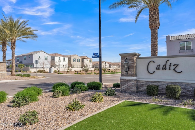 community sign with a residential view