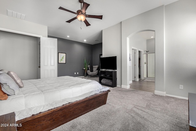 carpeted bedroom featuring ceiling fan