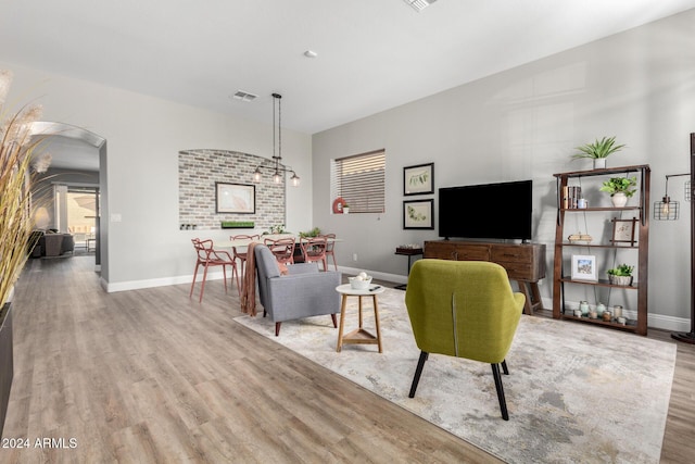 living room featuring light wood-type flooring