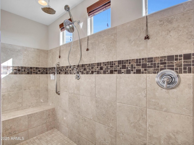 bathroom featuring a tile shower