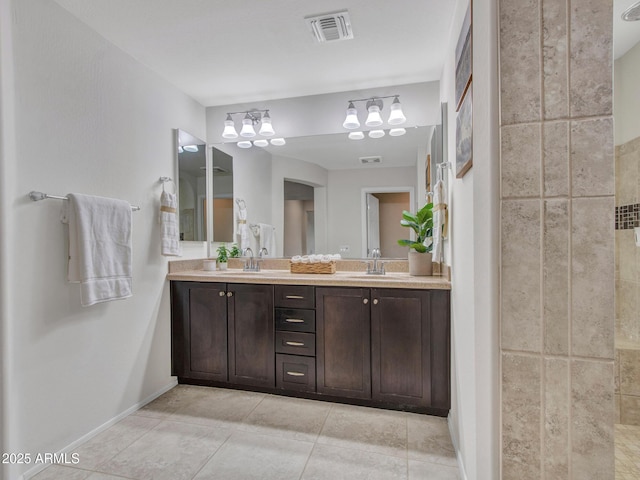 bathroom with vanity and tile patterned floors