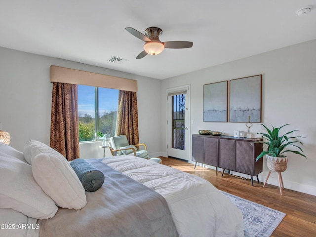 bedroom with ceiling fan and light wood-type flooring