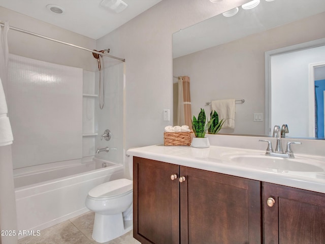 full bathroom with shower / tub combination, vanity, toilet, and tile patterned floors