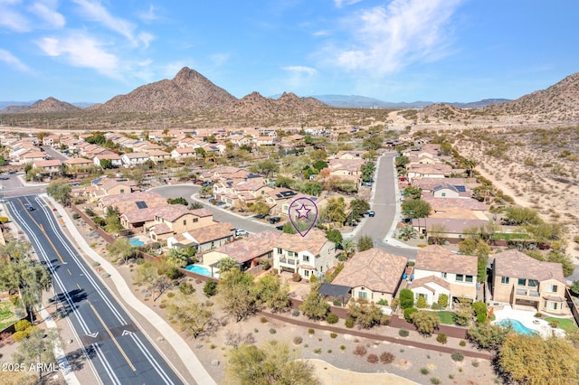 bird's eye view with a mountain view