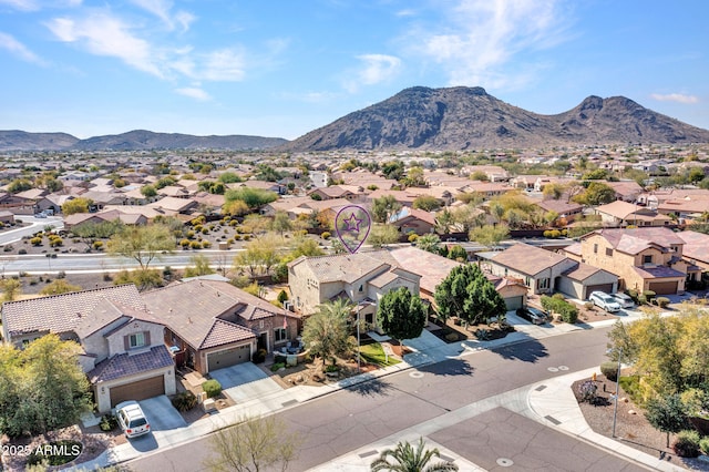 drone / aerial view featuring a mountain view