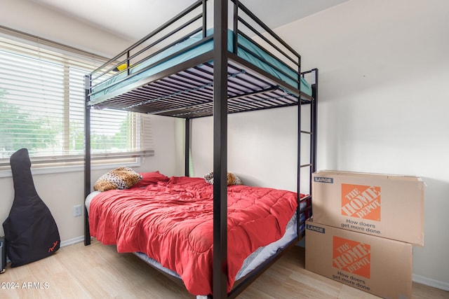 bedroom featuring hardwood / wood-style flooring