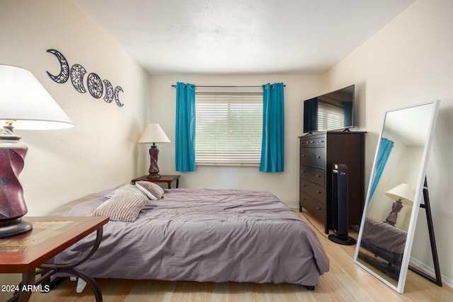 bedroom featuring light hardwood / wood-style flooring