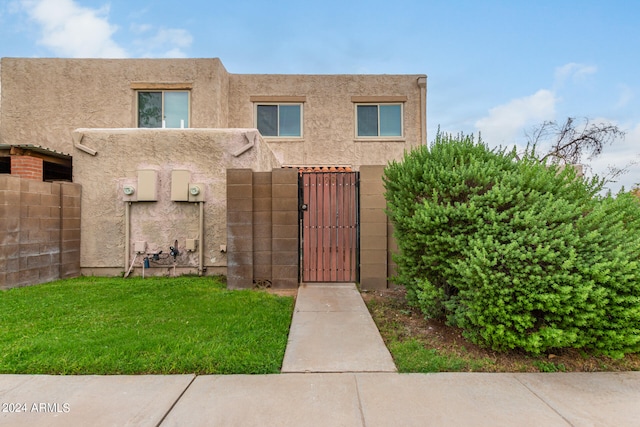 view of front of home with a front yard