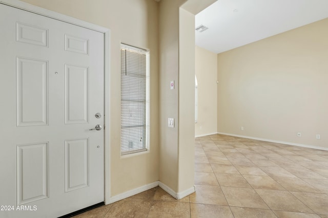 view of tiled foyer entrance