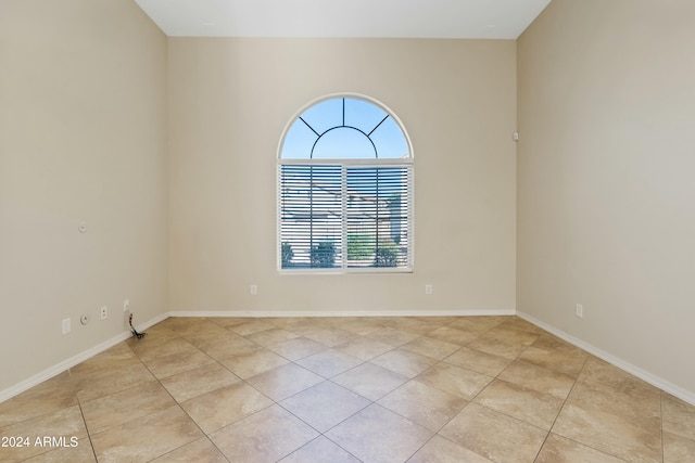 view of tiled spare room