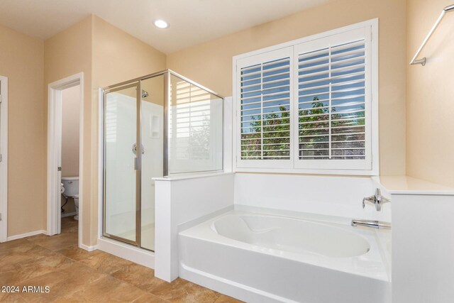 full bath with toilet, recessed lighting, a bath, and a shower stall
