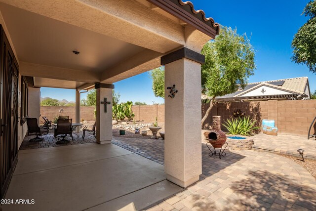 view of patio / terrace featuring a fenced backyard and outdoor dining space