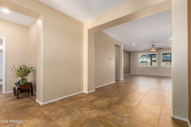 spare room with ceiling fan