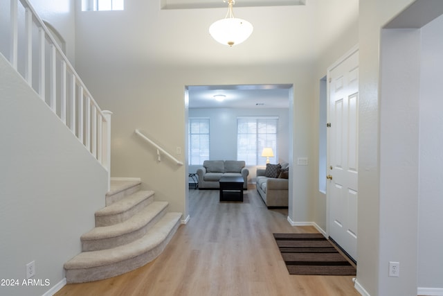 entrance foyer with light hardwood / wood-style floors