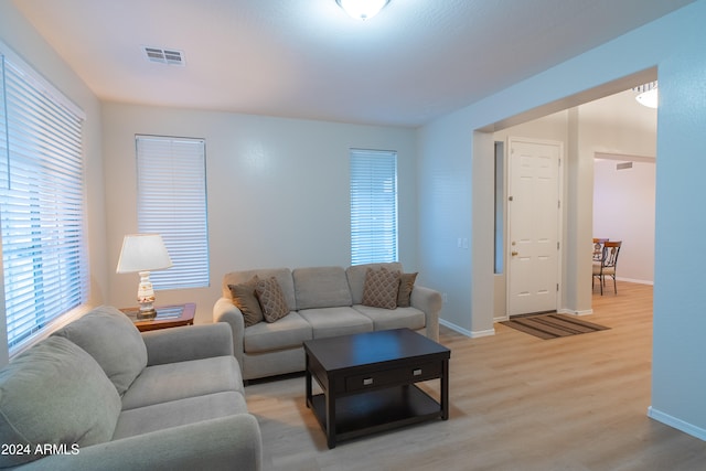 living room with light hardwood / wood-style floors